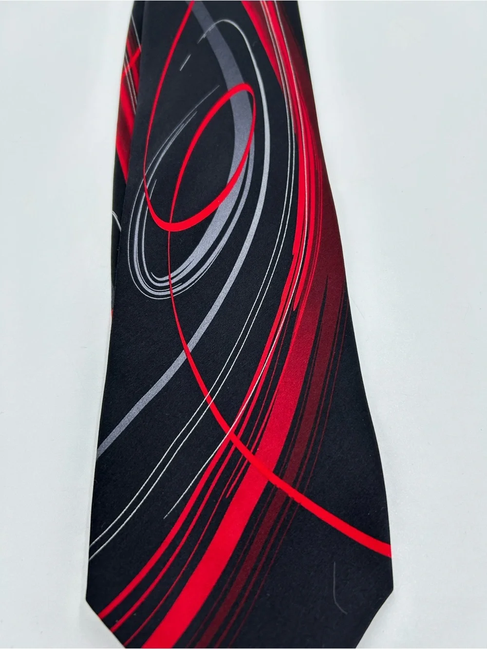 J. Garcia Abstract Silk Black Tie with Red and Gray Swirl Accent